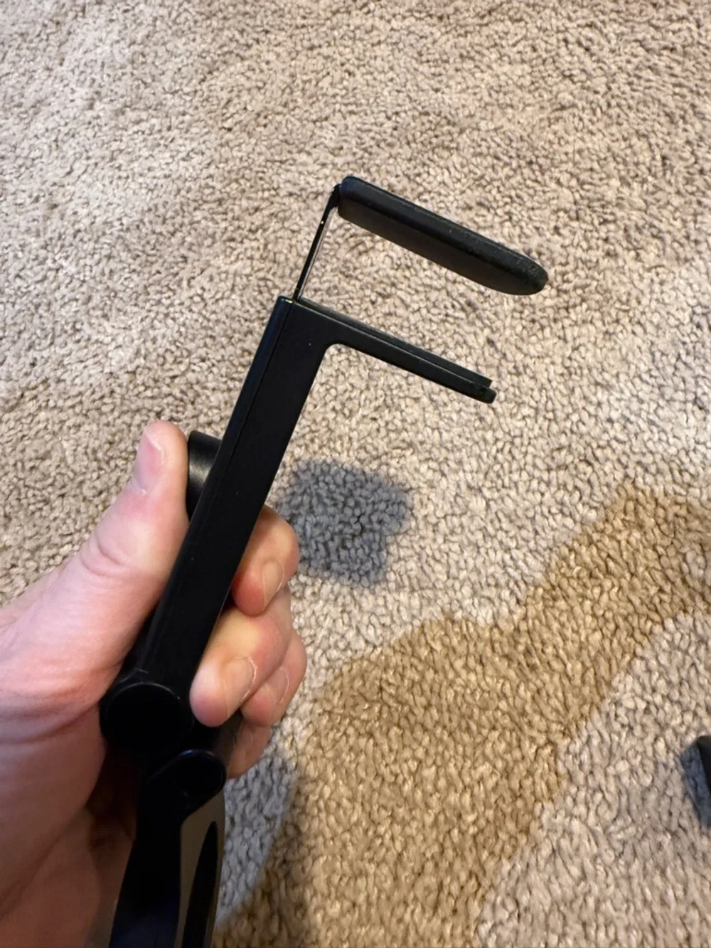 Pair of black clamp phone holders